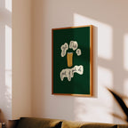 Framed artwork on a wall above a sofa in a living room