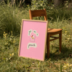 Pink framed picture with text and a drawing of a drink on grass