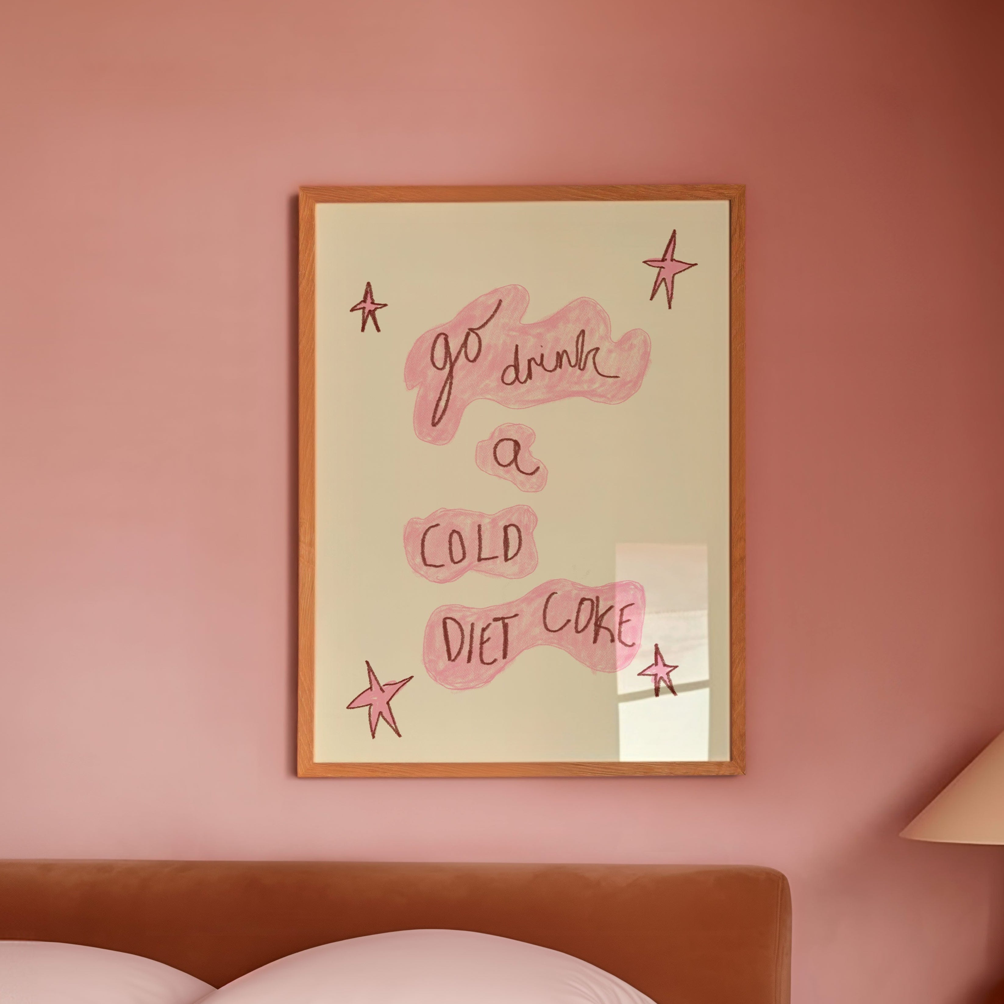 Bedroom with pink walls, a bed, and a lamp on a nightstand.