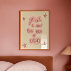 Bedroom with pink walls, a bed, and a lamp on a nightstand.