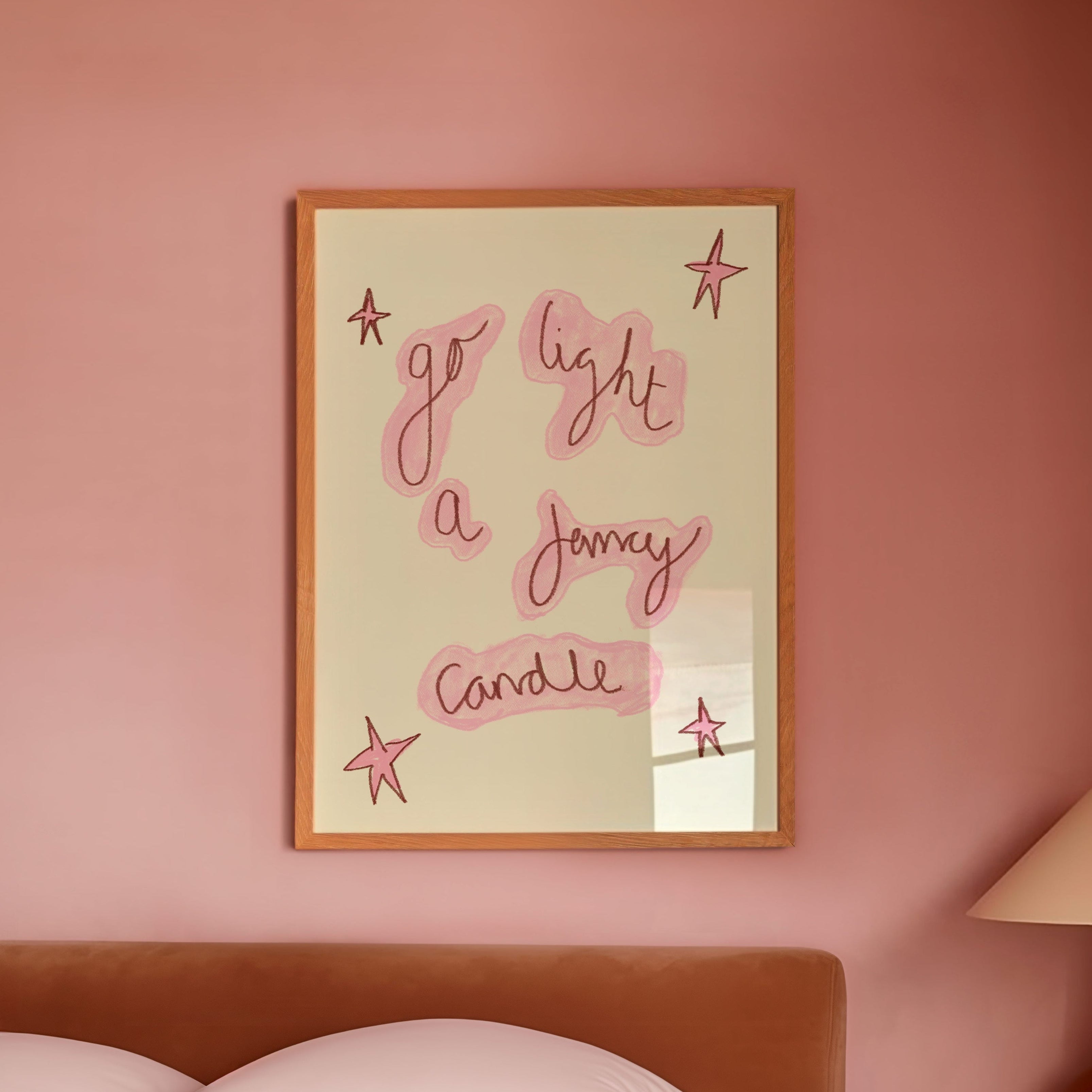 Bedroom with pink walls, a bed, and a lamp on a nightstand.