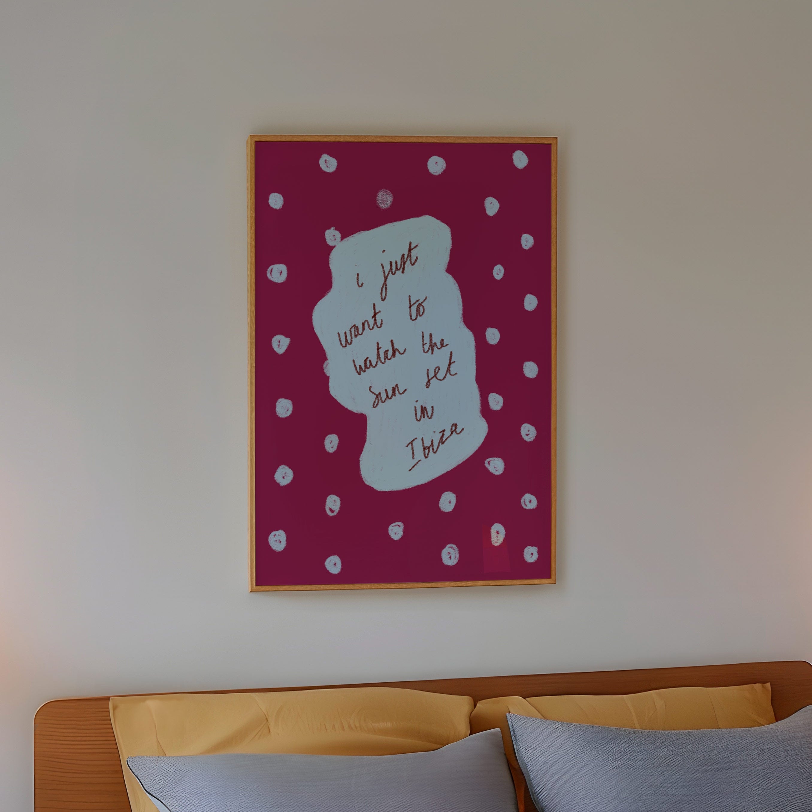 Bedroom with a bed, nightstands, and wall art