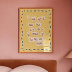 Bedroom with pink walls, a bed, and a framed motivational poster.